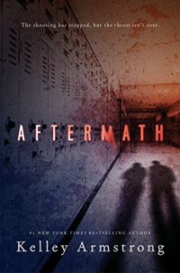 Shadows of two students walking a down a hall with lockers.